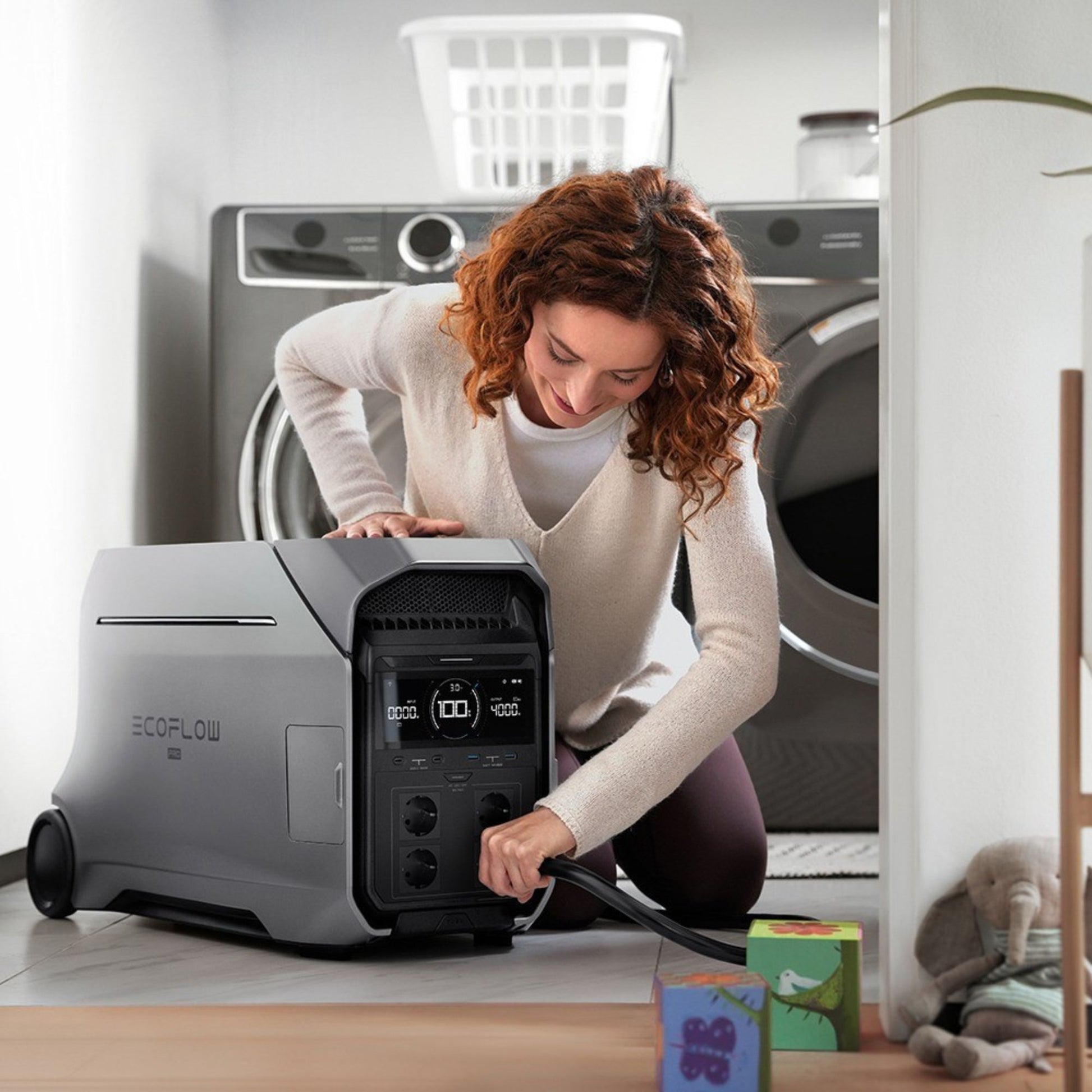 EcoFlow DELTA Pro 3 draagbare batterij in gebruik in woning, aangesloten op wasmachine