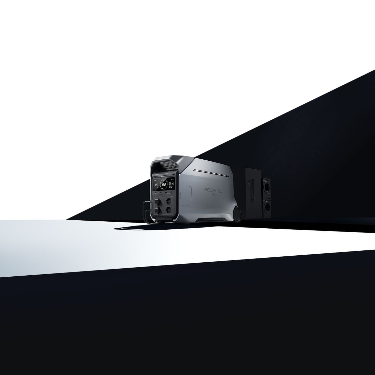 EcoFlow DELTA Pro 3 draagbare batterij op vloer met donker en licht geometrische achtergrond