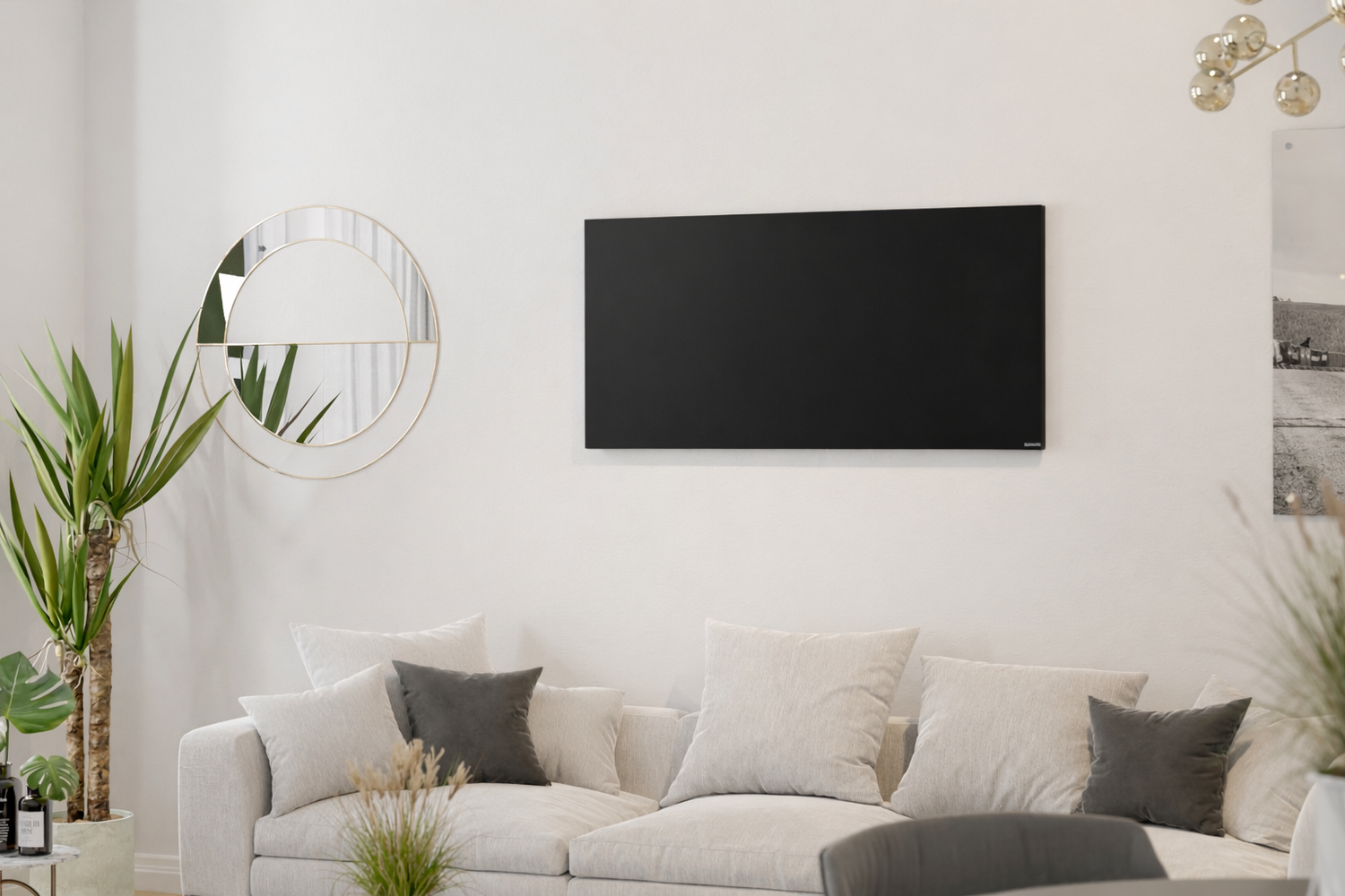 Herschel Comfort zwart infraroodpaneel aan muur boven sofa